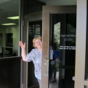 AppCard Office employee waving