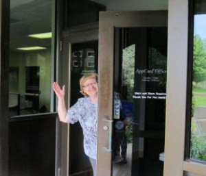 AppCard Office employee waving